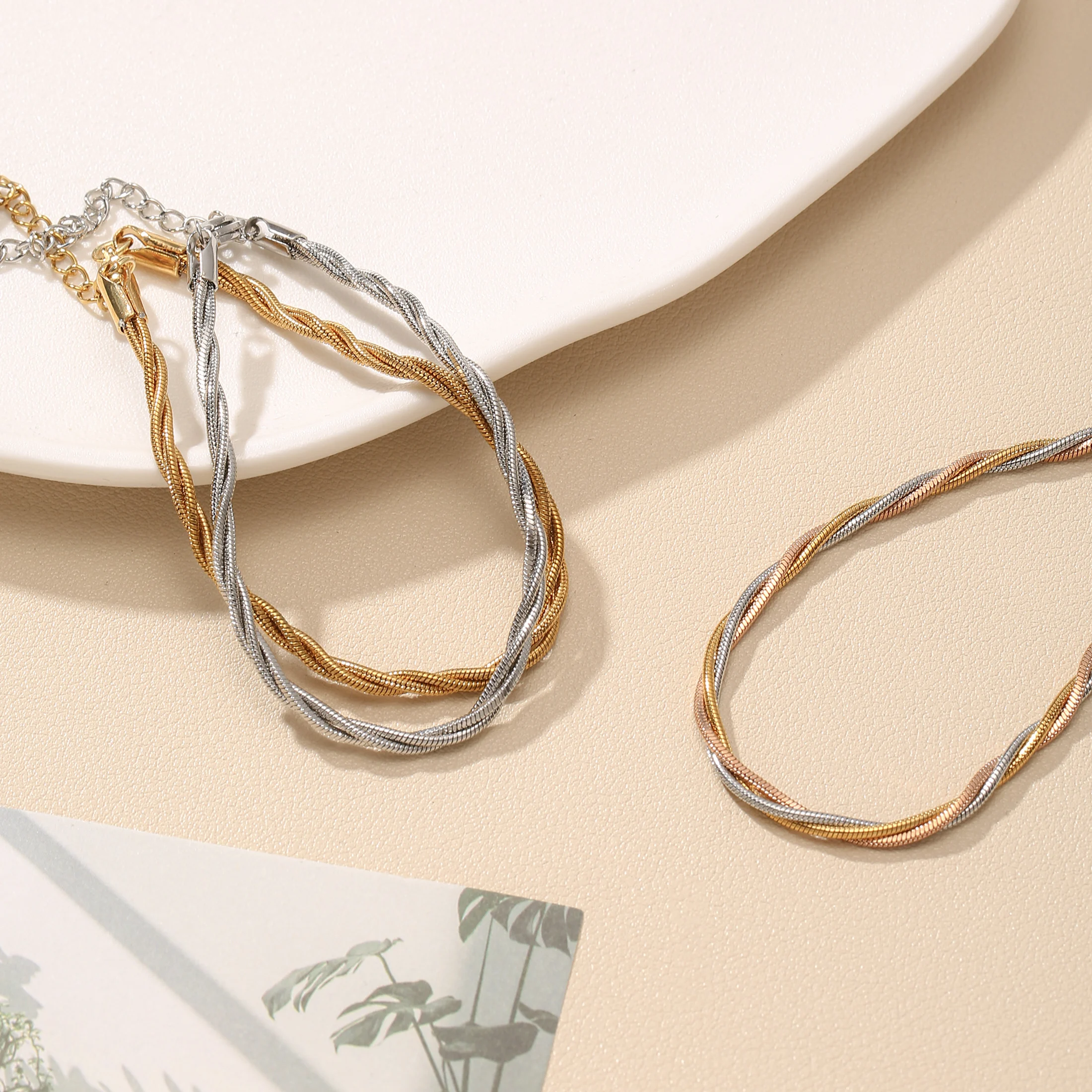 

Multi-tone Stainless Steel Twisted Snake Chain Bracelet with Extender for Women