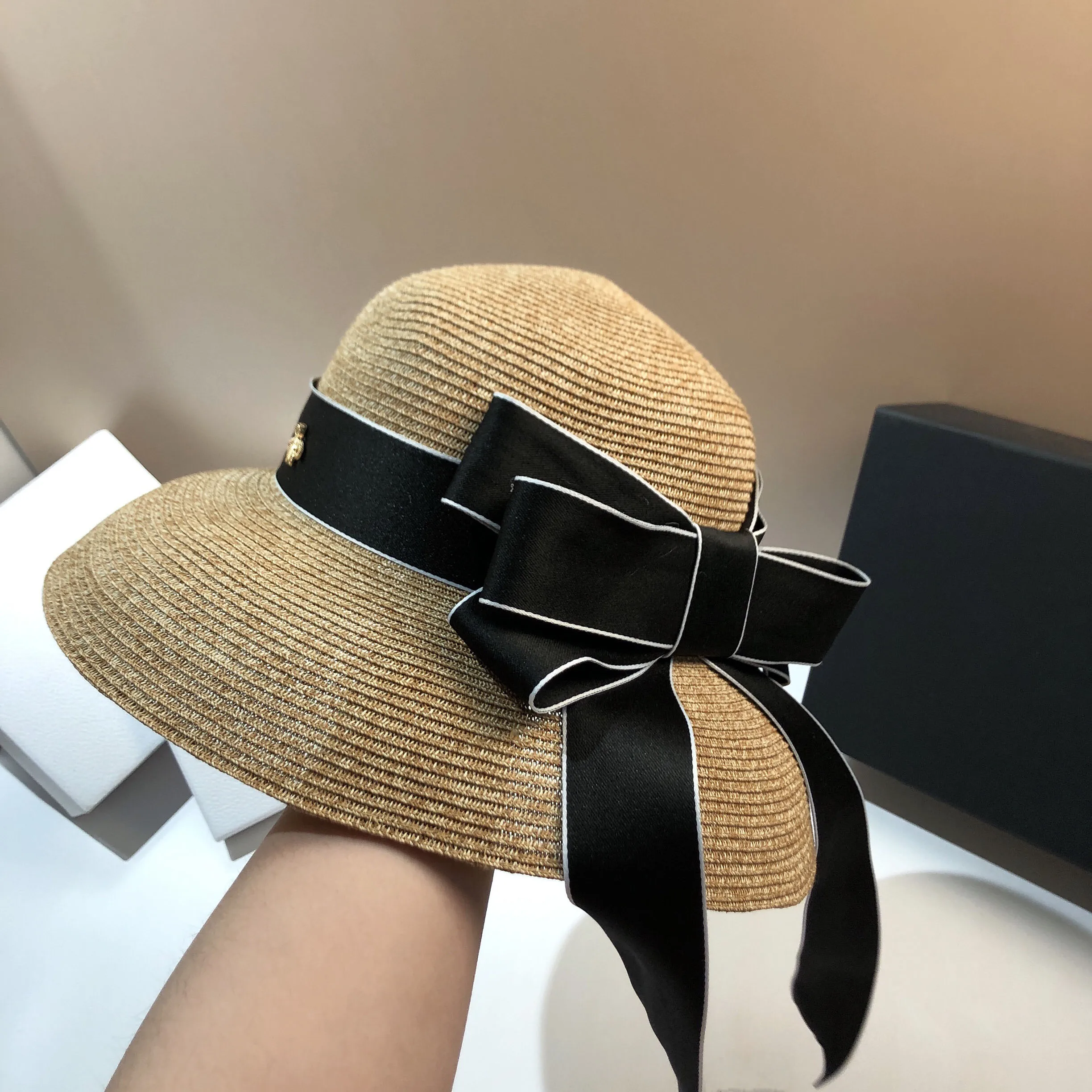 Summer high quality fine braid woven sun hat European and American French Hepburn style bow shade sun protection straw hat woman