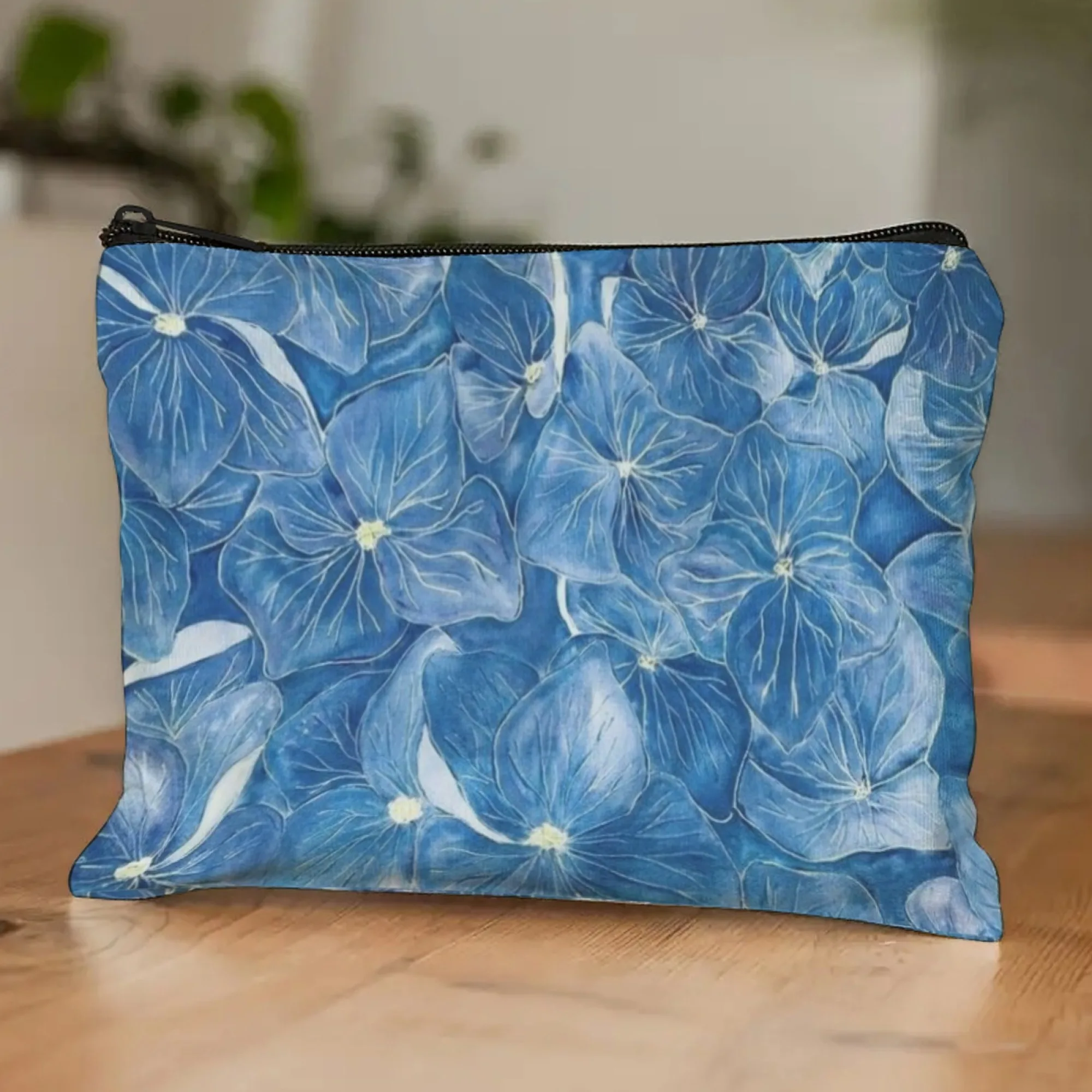 

Rural Watercolor Hydrangea Makeup Bag Soft Blue Blooms with Blurred Petals on White Base Zippered Nature-Inspired Organizer