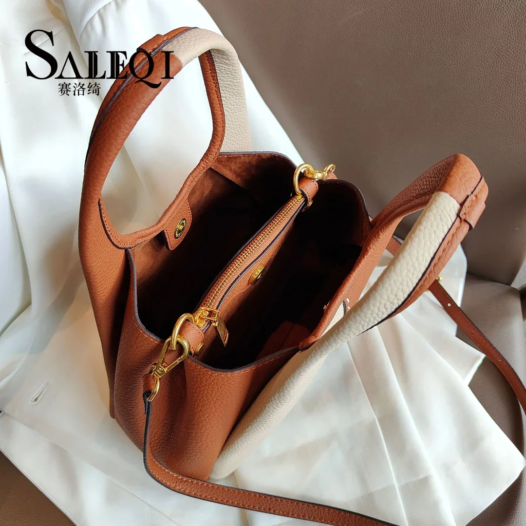 Genuine leather New vegetable basket handbag  simple and versatile  The Korean version of the contrasting color commuting bag