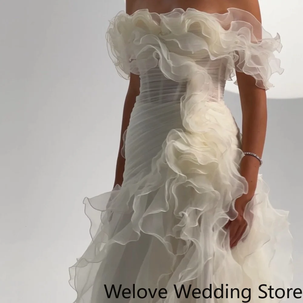 White Bridal Gown Puff Ruffle Short Sleeves Sheer Corset Bodice Multi‑Layer Ruffled Organza Tiered A‑Line Sweep Train