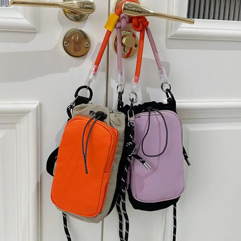 Drawstring Mini Crossbody Bag Color Block Sports Nylon Drawstring Crossbody Bag For Sports And Travel Outdoor Small Phone Bag