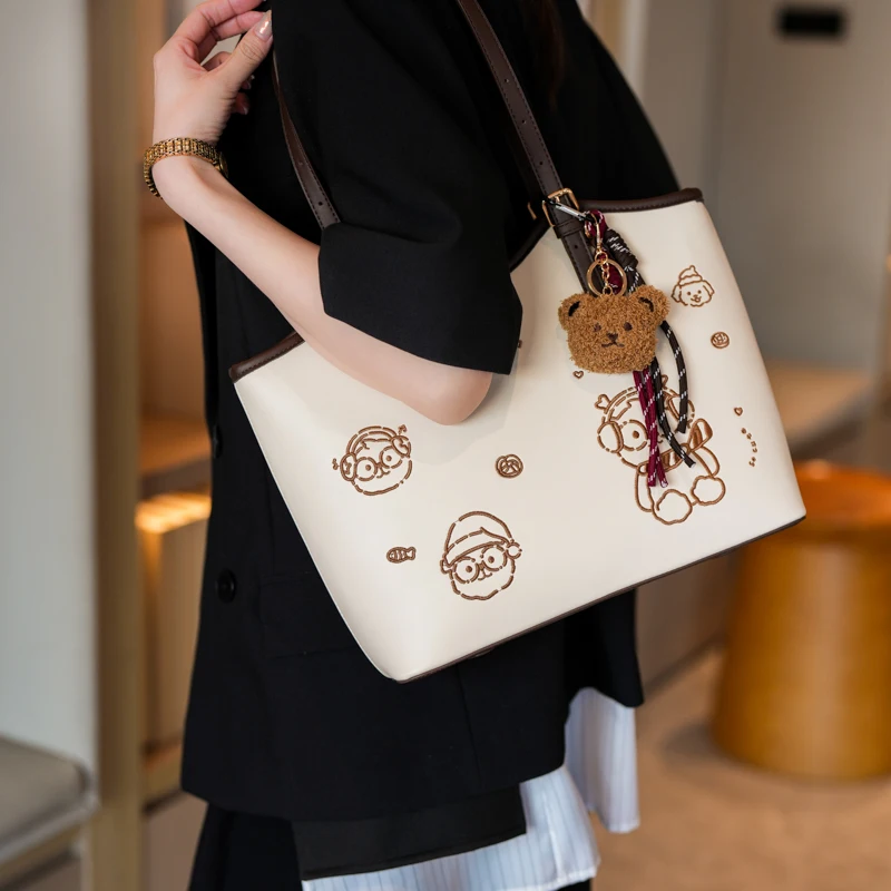 

2025 Simple and Versatile Cartoon Large Capacity Travel Outdoor Tote Bag for Women's Commuter Single Shoulder Handbag