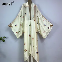 WINYI lato afryka kobiety sweter motyl z nadrukiem długa sukienka elegancka impreza Boho Maxi wakacje na plaży Kimonos kaftan