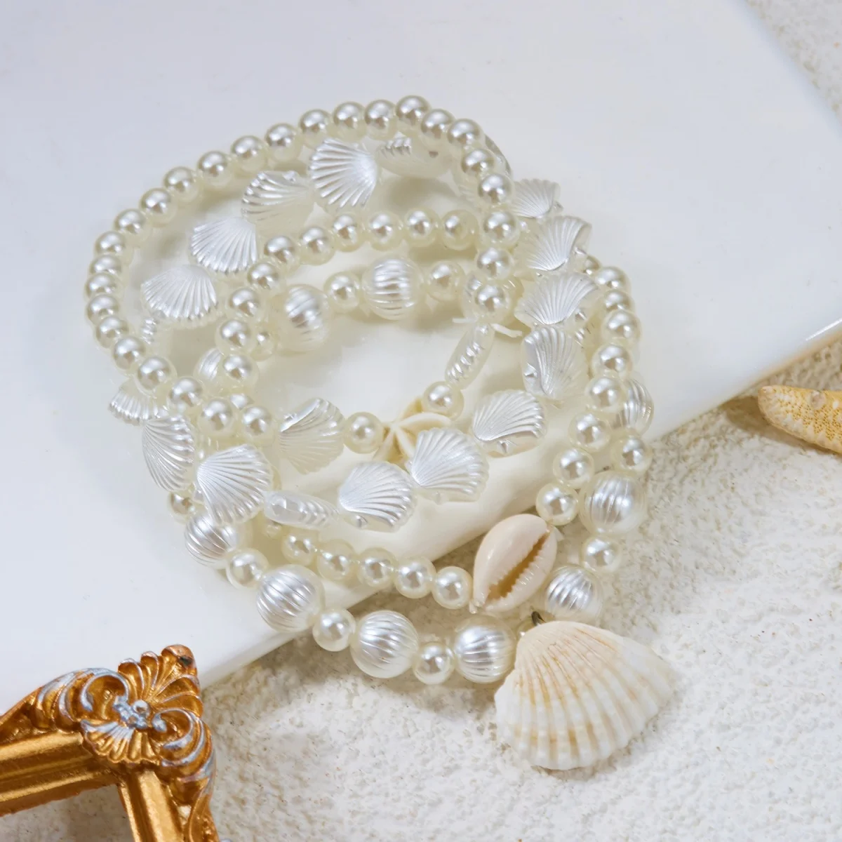 Mehrlagige Sommer-Armbänder aus Kunstharz mit Seesternen, Muscheln und simulierten Perlen für Damen und Herren, stapelbare Armbänder im Ozean-Stil. – Detail 17
