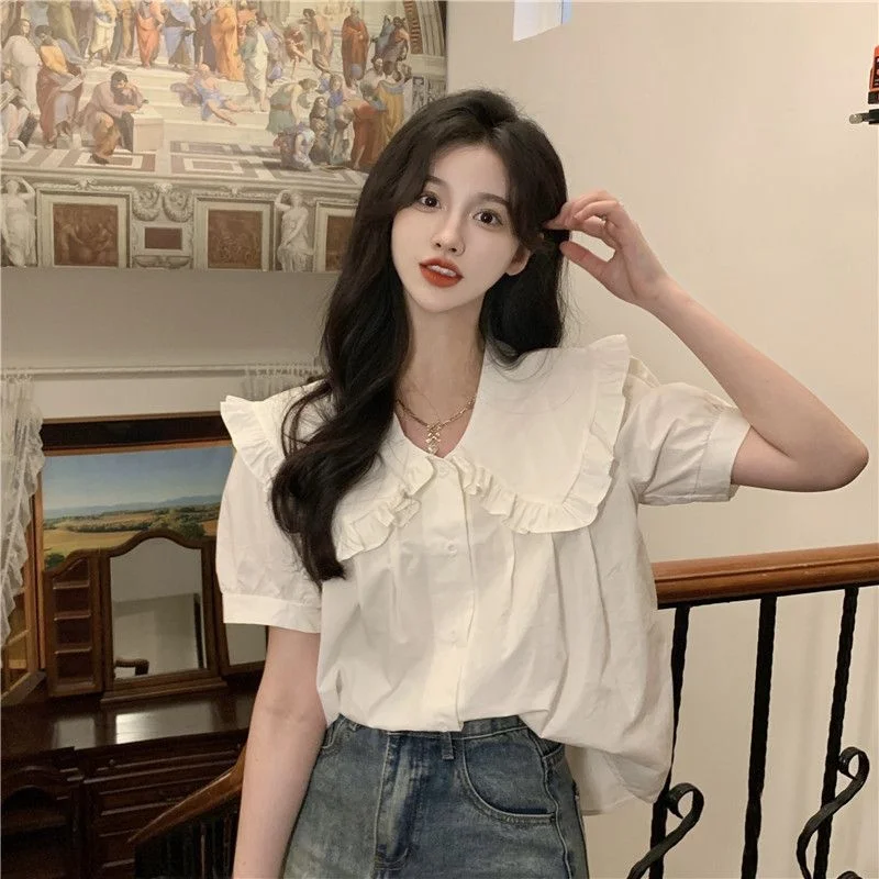 

e White irt Женская летняя новинка Sle Age-Defng ort Sve Свободный топ Кукольный воротник Корейский Sle Полиэфирное волокно