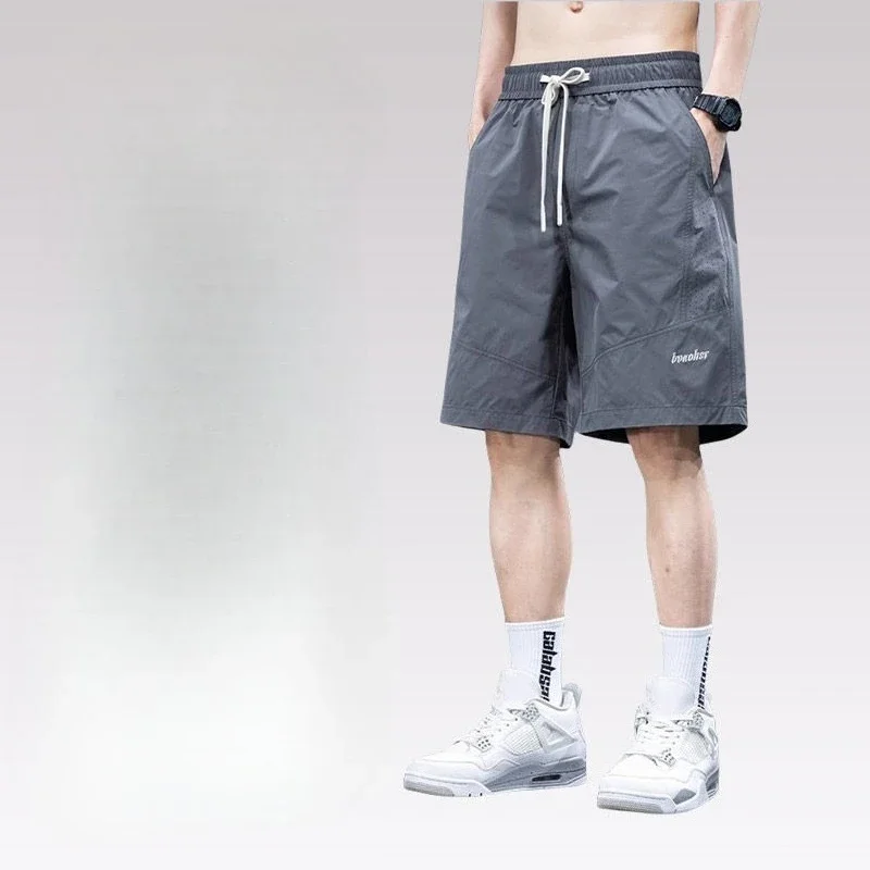 Celana Pendek Kargo Pria Panjang Solid Bermuda dengan Tali Tarik Celana Pendek Pinggang Setengah Elastis Longgar Lebar untuk Pria Desainer Saku