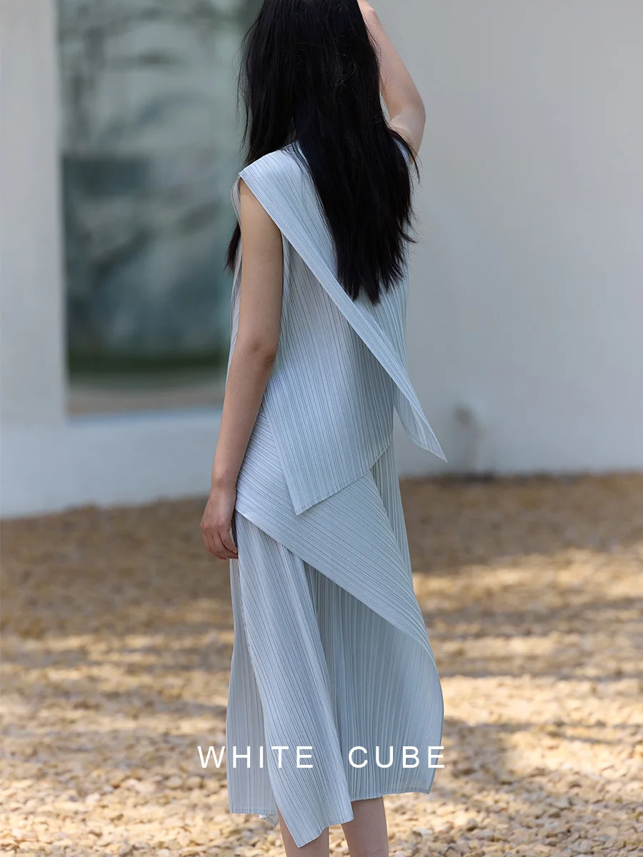 YUDX 2025 ensemble deux pièces plissé sans manches pour femmes haut à ourlet asymétrique et jupe mi-mollet argent décontracté vêtements de mode quotidiens