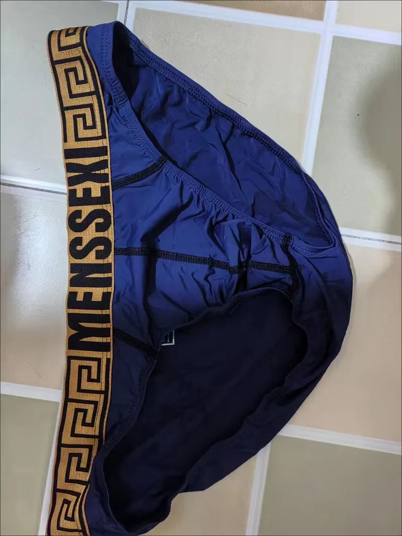 بيكيني مثير للرجال مرن عصري ناعم من الحرير الجليدي ملمس رائع سريع الجفاف على شكل حرف T من الخلف ثونغ مثلي الجنس مثير منخفضة الارتفاع القضيب الانتفاخ g-string