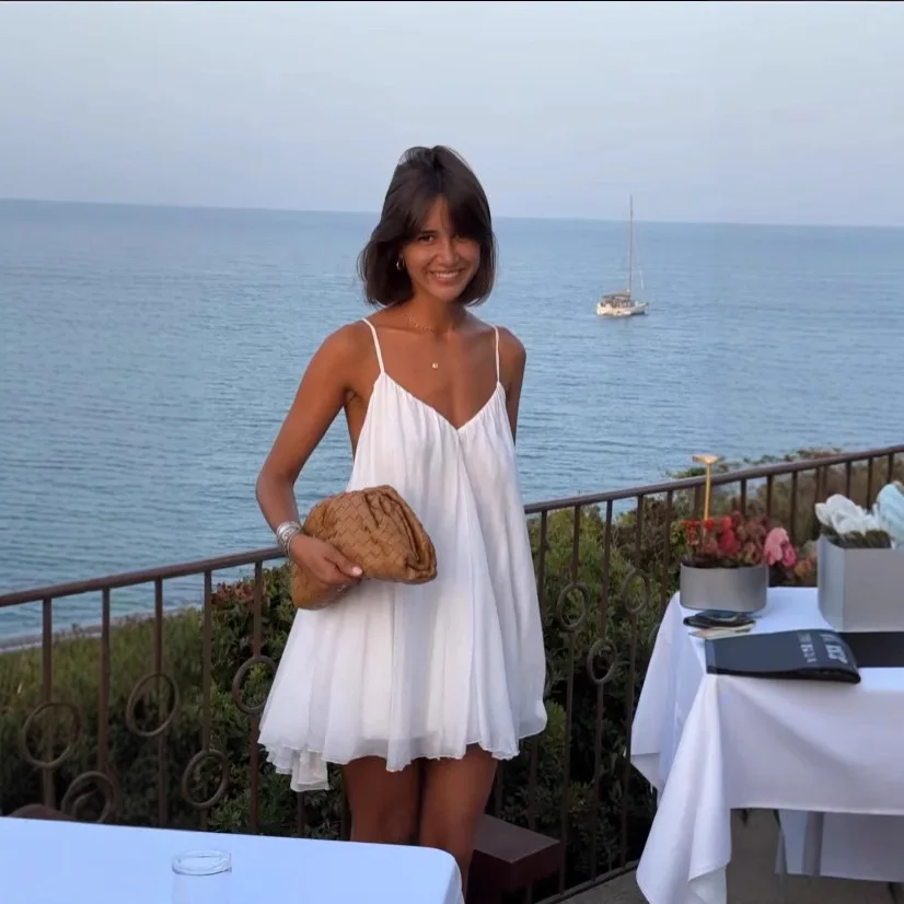 

2026 New Fashionable Backless Ruffle Dresses Women Summer Sexy And Elegant Solid Color V-neck Suspender Mini Dress For Women