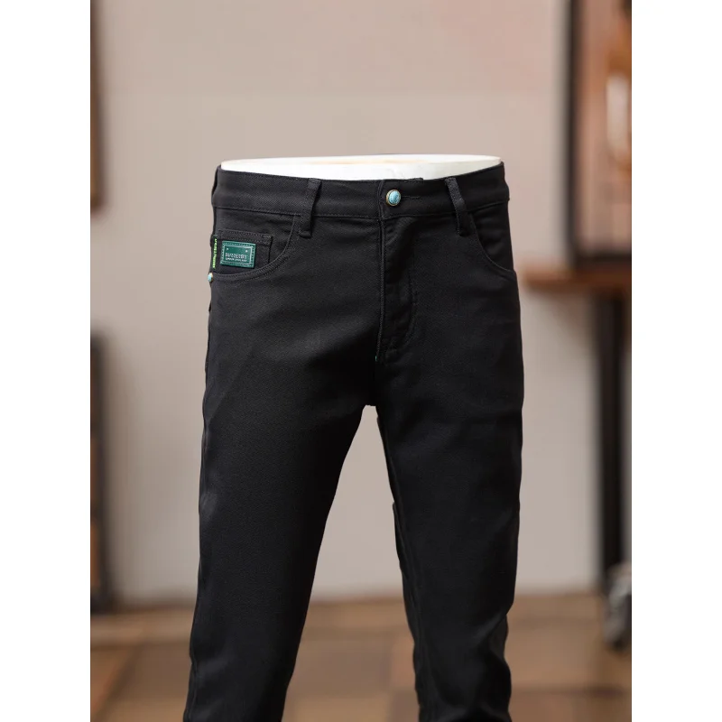 

Pure black jeans men's 2025 autumn new trend, simple and slim fit, small feet, casual and versatile high-end men's pants