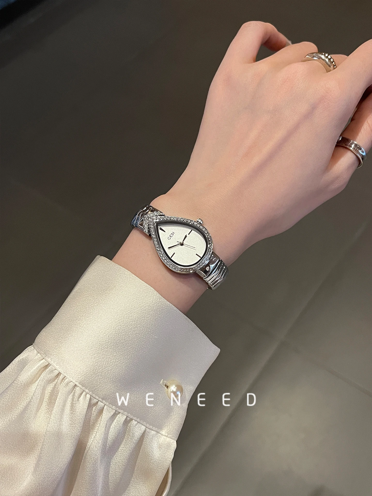 

2025 new watch for women, light luxury water drop design high-end temperament women's watch, elegant women's watch original gift