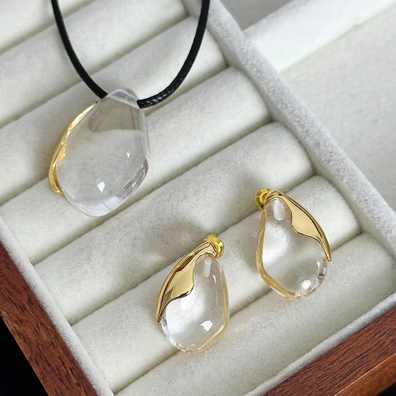 

New white crystal pendant earrings necklace, copper plated with 18K gold, long versatile accessories, retro sweater chain.