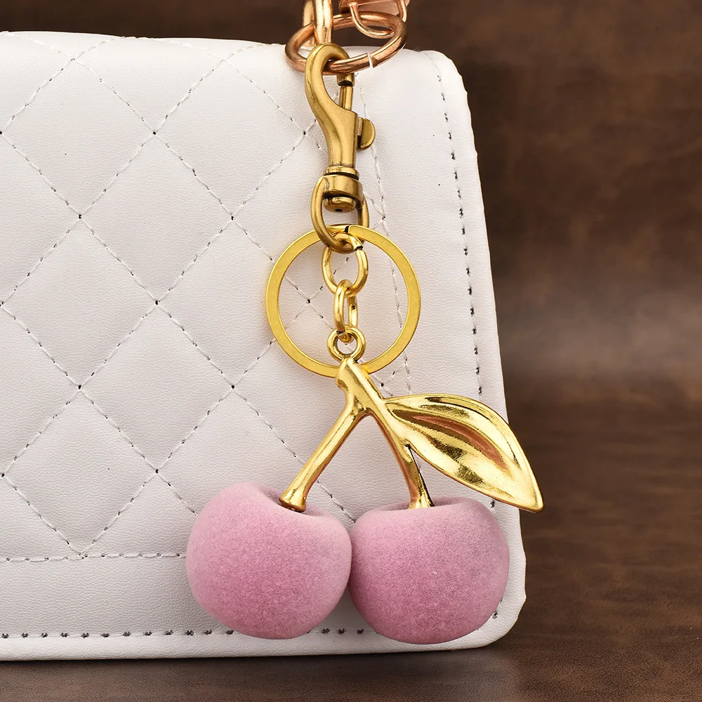 Pingente de bolsa com chaveiro de cerejas flocadas