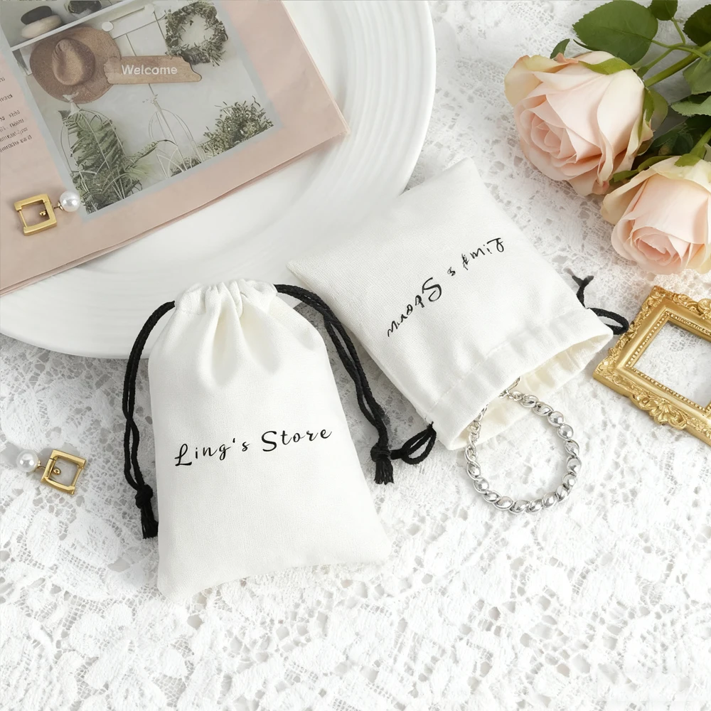 

50Pcs Custom Logo White Muslin Jewelry Bag Cotton Drawstring Pouch Wedding Favors Gift Keychain Perfume Cosmetic Pearl Packaging