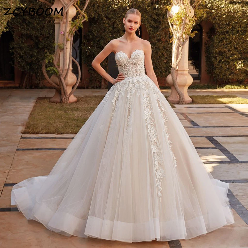 

Luxury Lace Appliques Sweetheart Ball Gown Wedding Dresses 2024 Strapless Court Train Backless Women Bride Gown Vestido De Novia