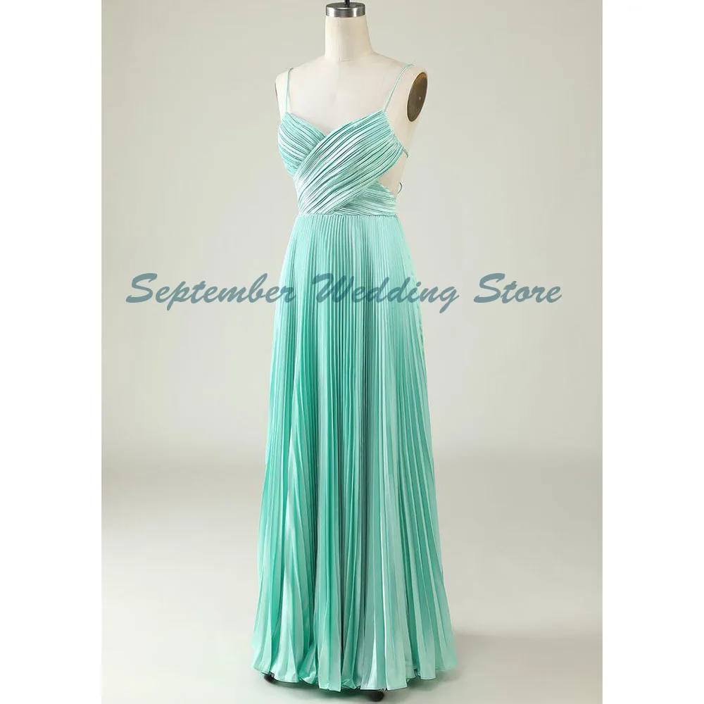 Abiti da festa da sera senza schienale senza maniche eleganti verdi con cinturino per spaghetti Pieghevoli abiti da ballo lunghi fino al pavimento di alta qualità