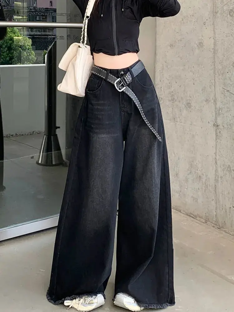 جينز أنيق أمريكي عتيق أسود واسع الساق للنساء بخصر عالٍ وفضفاض مناسب للتخسيس وحاشية خام بطول الأرض من قماش الدنيم