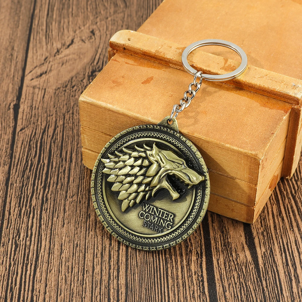 Game of Thrones Winter Is Coming House Stark Wolf Head Badge Key Chains Pendant Ice And Fire Keyring Llaveros Of Movie Gifts