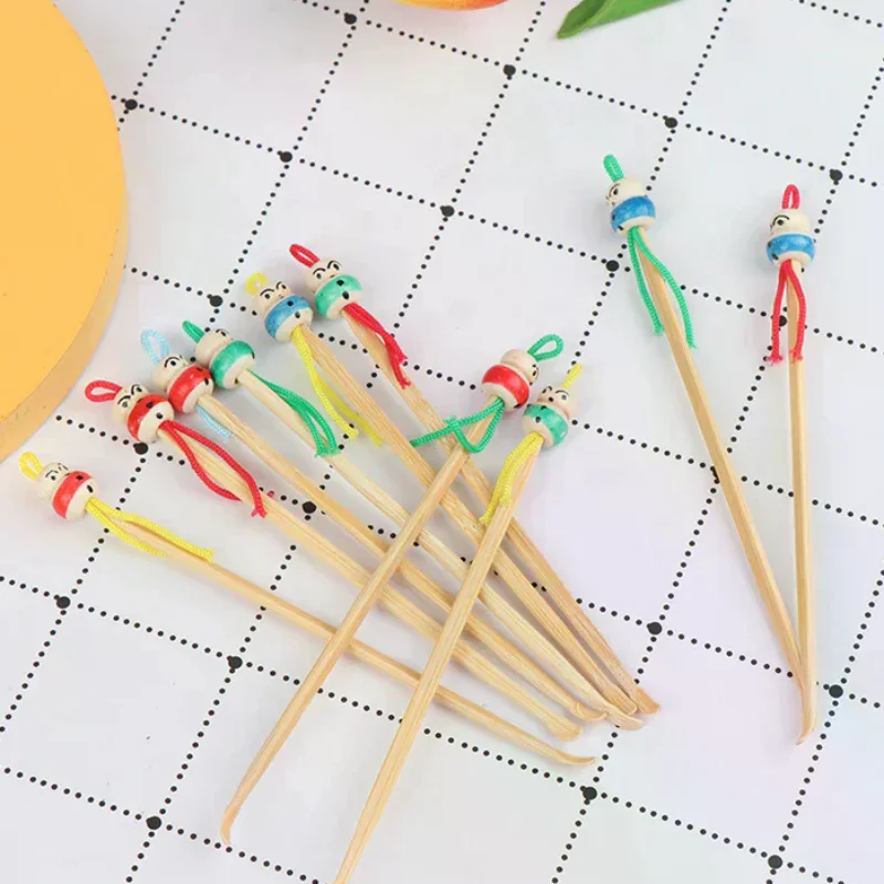 

10pcs/lot Cartoons Cute Mini Doll Ear Picks Wood Bamboo Ear Picks Wax Remover Cleaner Ear Care Tool Random Color Hot Selling
