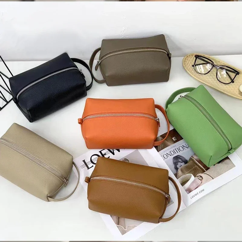 High Quality Soft Grain Cow Leather Makeup Storage Pouch Portable Sport Cosmetic Bag for Travel Handle Wash Bag