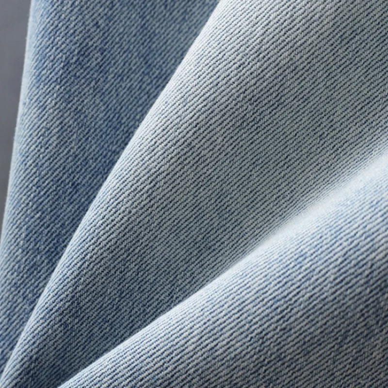 سراويل جينز ممزقة بأرجل واسعة من علامة تجارية أمريكية عالية الجودة للرجال بأنبوب مستقيم فضفاض بألوان متباينة