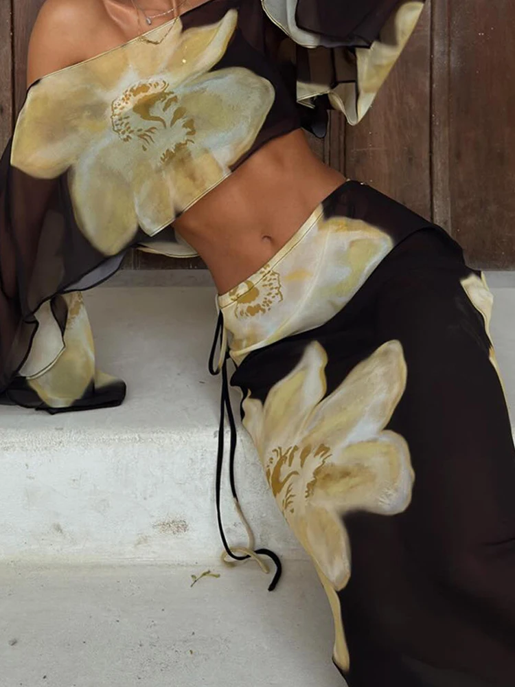 

Модный комплект из 2 предметов с принтом: элегантный укороченный топ с открытыми плечами и юбка. Женский повседневный костюм с длинным рукавом, облегающий, для вечеринок.