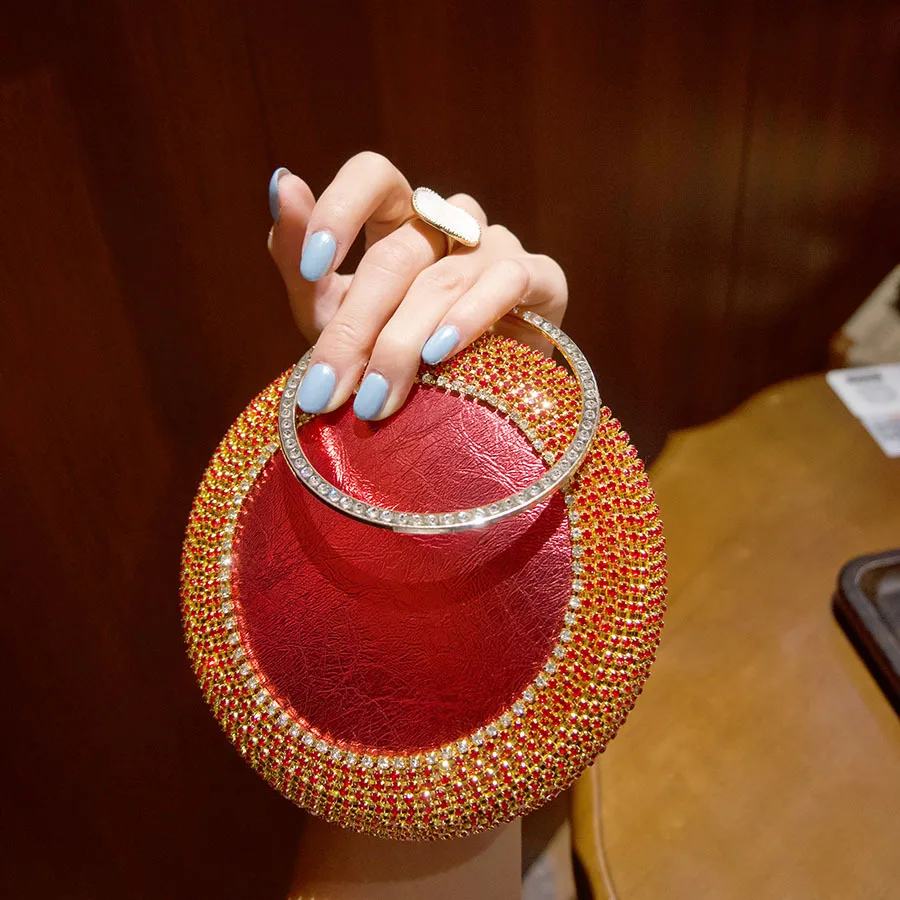 

Luxury clutch bag, shiny rhinestone ring handbag, exquisite diamond-encrusted fashionable round bag.