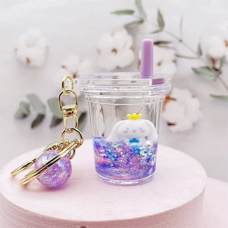 

1PCSBlue big-eared floating doll in oil, sand bottle keychain, cute cartoon keychain