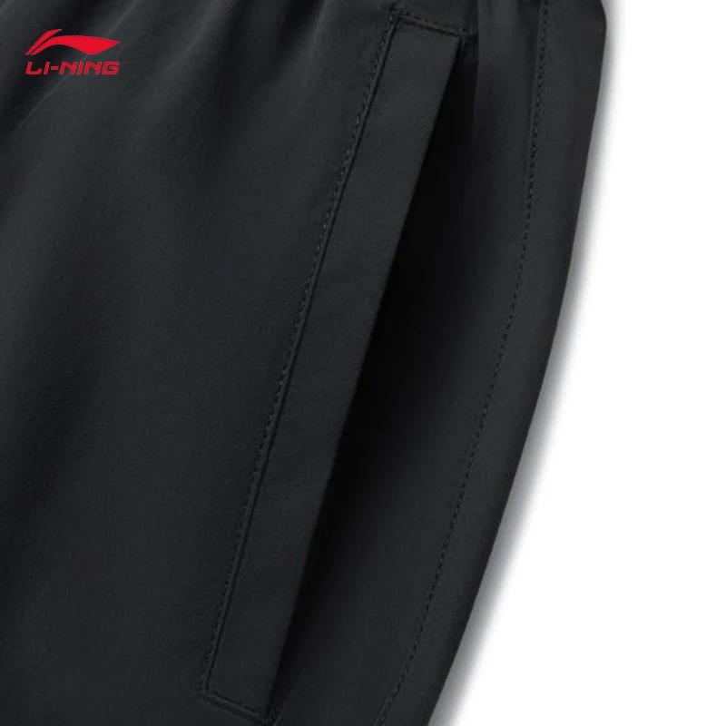 LI-NING BADFIVE Calça esportiva masculina com amarração de pés, gelo, confortável, absorção de umidade, solta AYKV511