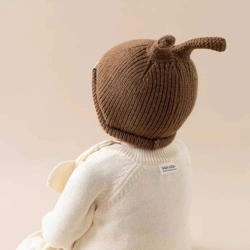 Nuovo caldo cappello lavorato a maglia antivento carino cappello di protezione per le orecchie berretto pullover resistente al freddo per 0-1 anni
