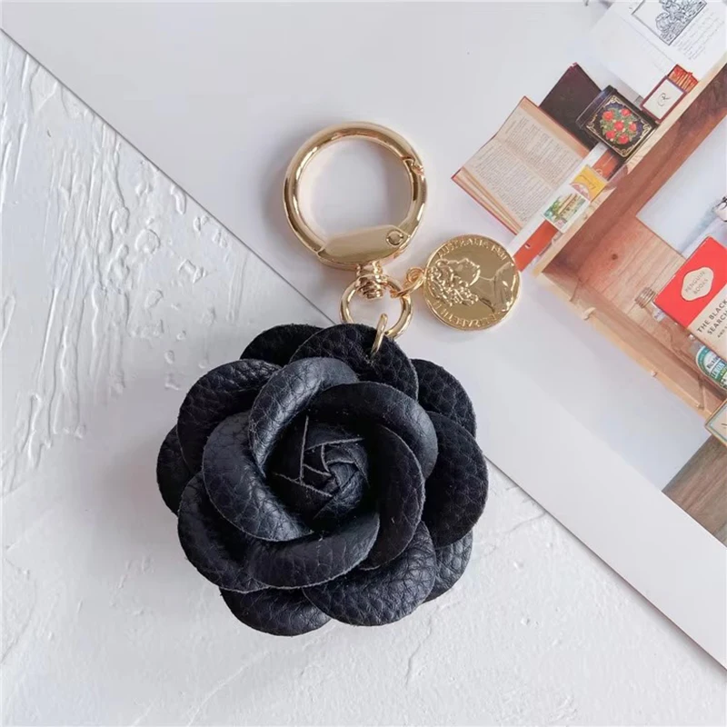 Fashion leather camellia car keychain cute flower backpack pendant accessories personality keychain ring women