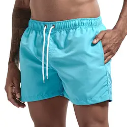 Pantalones cortos de playa para hombre, bañador de secado rápido con bolsillo, color liso, a la moda, con cordón