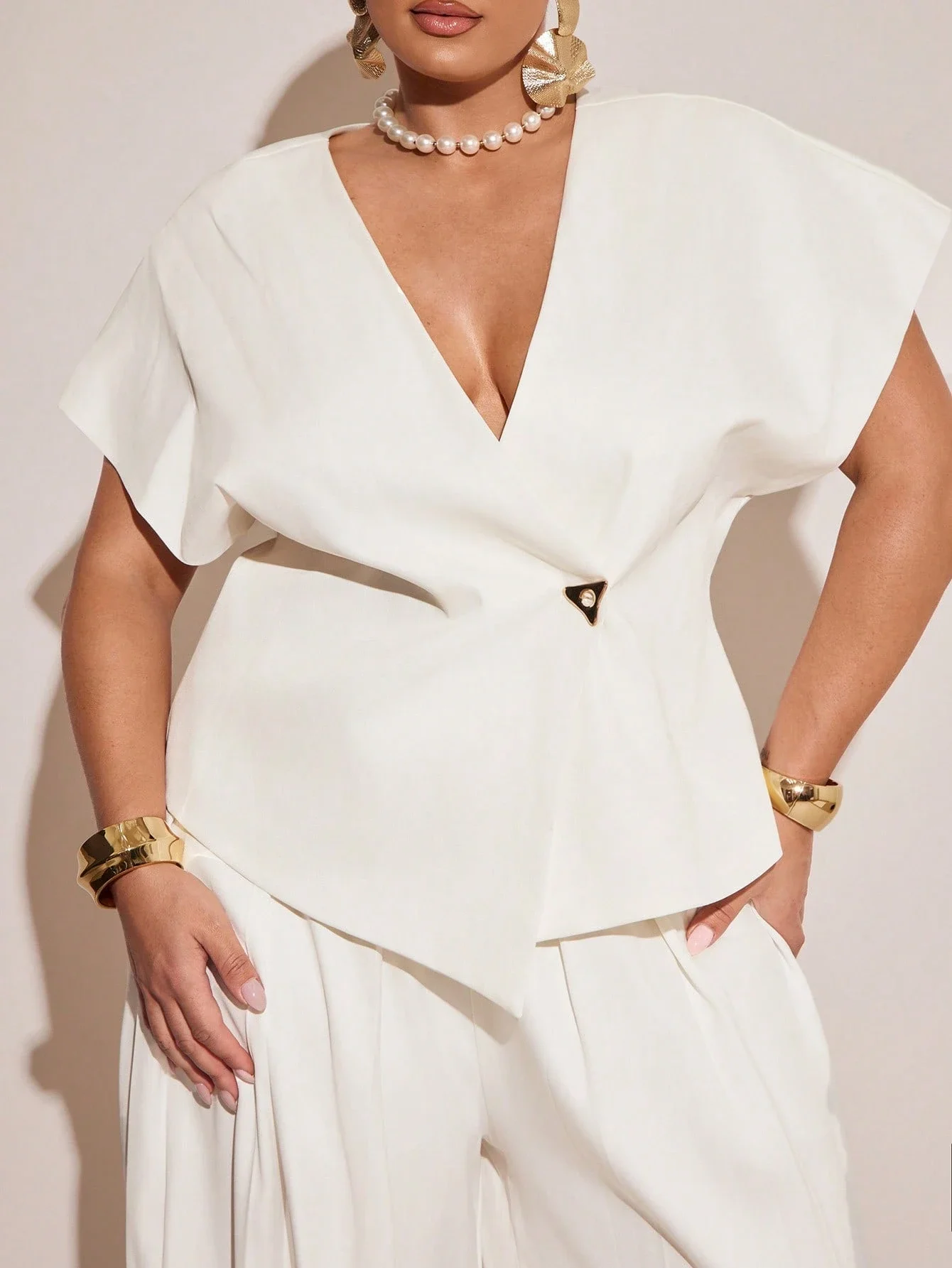 

Minimalist Bat Sleeve Wrap Top And Pleated Wide Leg Pants Set