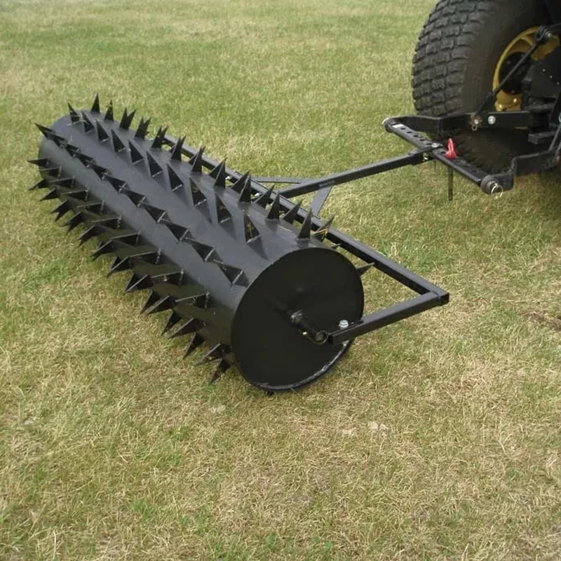 With pin-type hanging device and lawn roller structure, for lawn all-terrain vehicle spike aerator