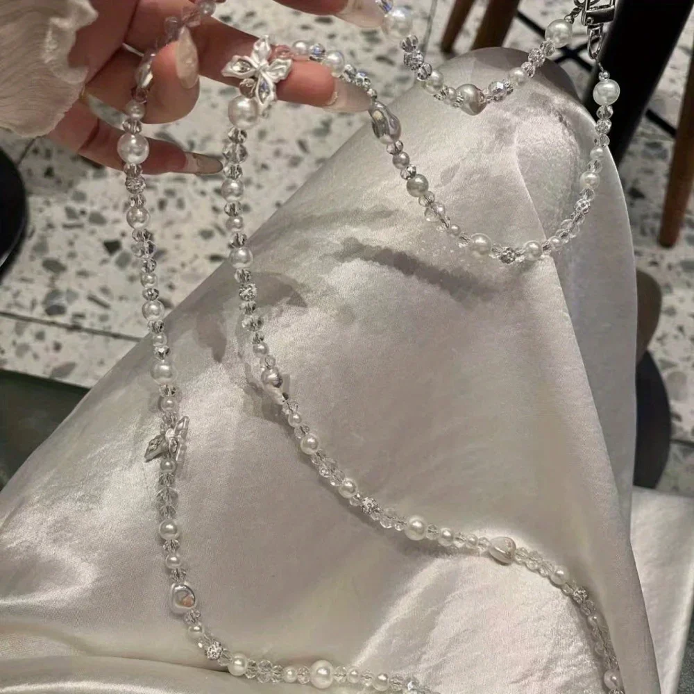 [a203] سلسلة هاتف محمول أصلية مطرزة بالكريستال الملون وسلسلة هاتف محمول بظهر قطري كريستالي وسلسلة طويلة