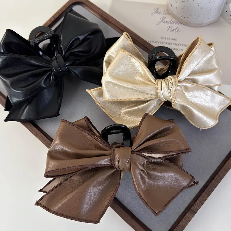 

Retro PU Leather Bow Hair Claw Clip Women Simple Solid Color Back of Head Disc Hair Shark Clip Girl Hair Accessories