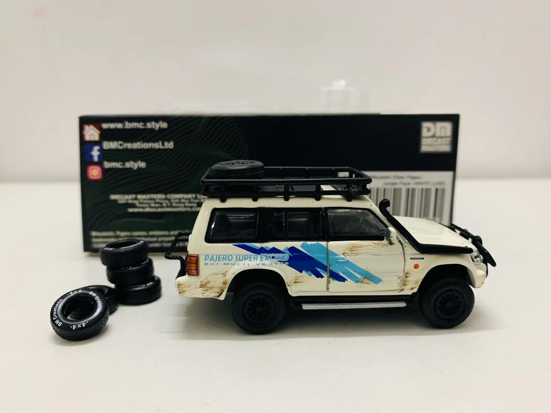 2Gen Pajero Jungle Pack White (LHD) 1/64 Scale Diecast Miniature Car