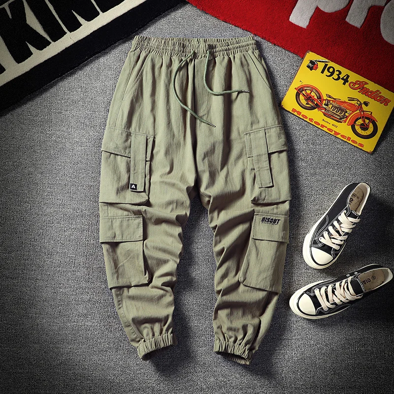 Trendy Instagram workwear pants for men with straight and loose sleeves, new versatile multi pocket leggings,