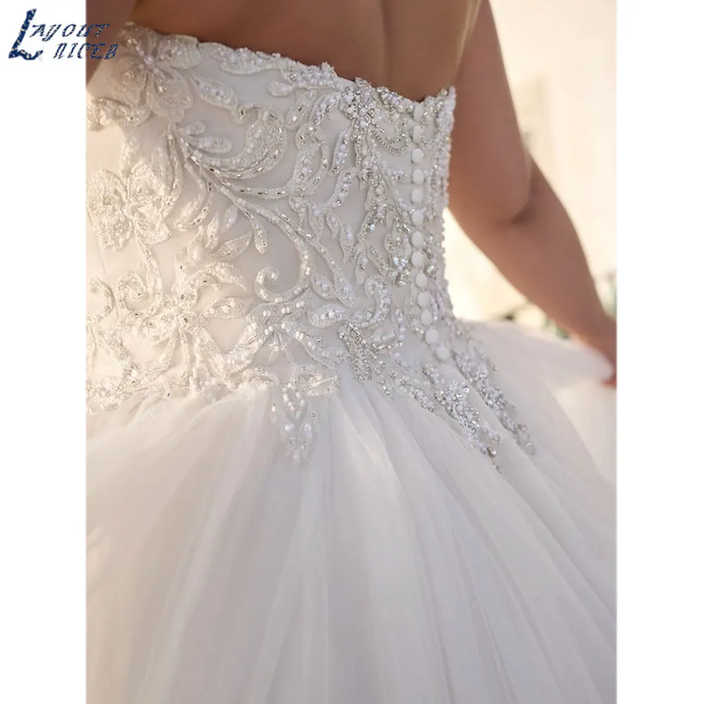 LAYOUT NICEB Beading Apliques A Linha Vestido De Noiva Strapless Backless Tulle Vestidos De Casamento Custom Made vestido de noiva casamentoLAYOUT NICEB Beading Apliques A Linha Vestido De Noiva Strapless Backless Tull