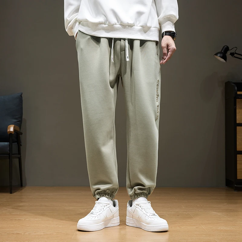 

The new trendy brand breathable straight-leg sport pants from Student Spring and Autumn are versatile long pants for casual men