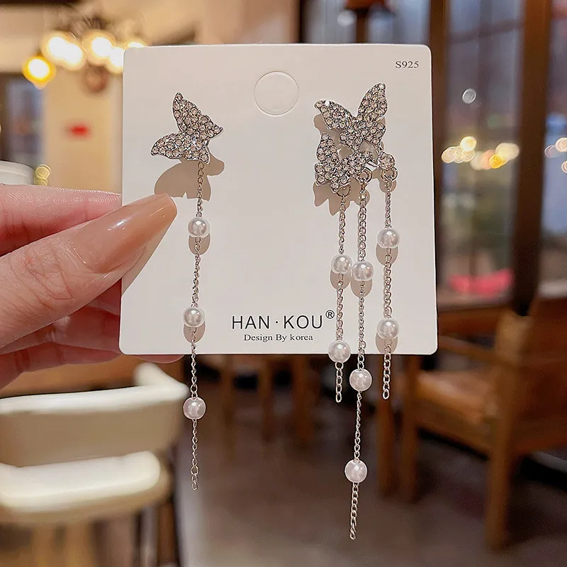Elegante vergoldete Zirkonia-Schneeflocken-Ohrringe mit langen Quasten für Damen, Strass-Tropfenohrringe, Partygeschenk – Detail 18