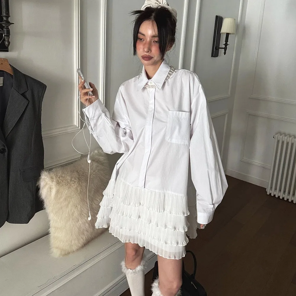 Outono feminino coreano dongdaemun nicho design sentido, cor contrastante emenda bolo camisa vestido