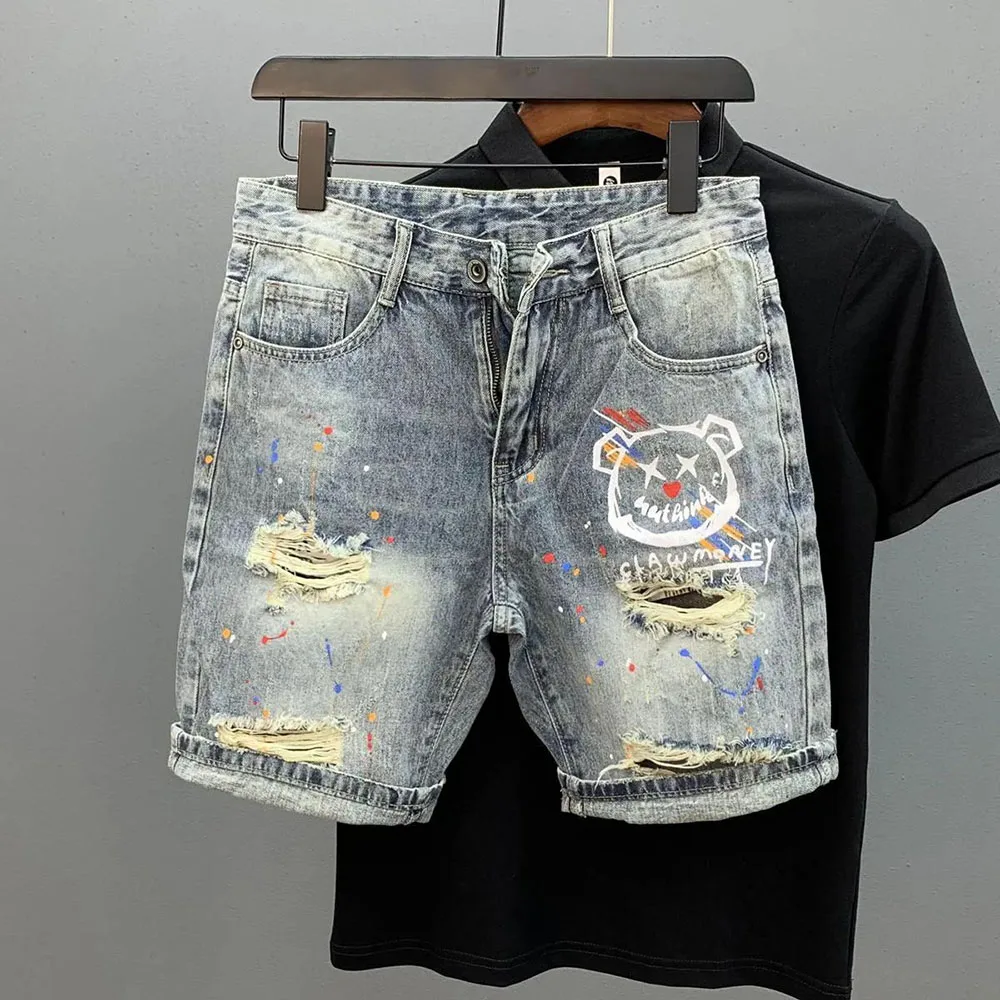 Wąsy kota zgrywanie spodenki dżinsowe męskie spersonalizowany nadruk Splash Ink lato nowy koreański styl szczupła moda pięciopięte spodnie