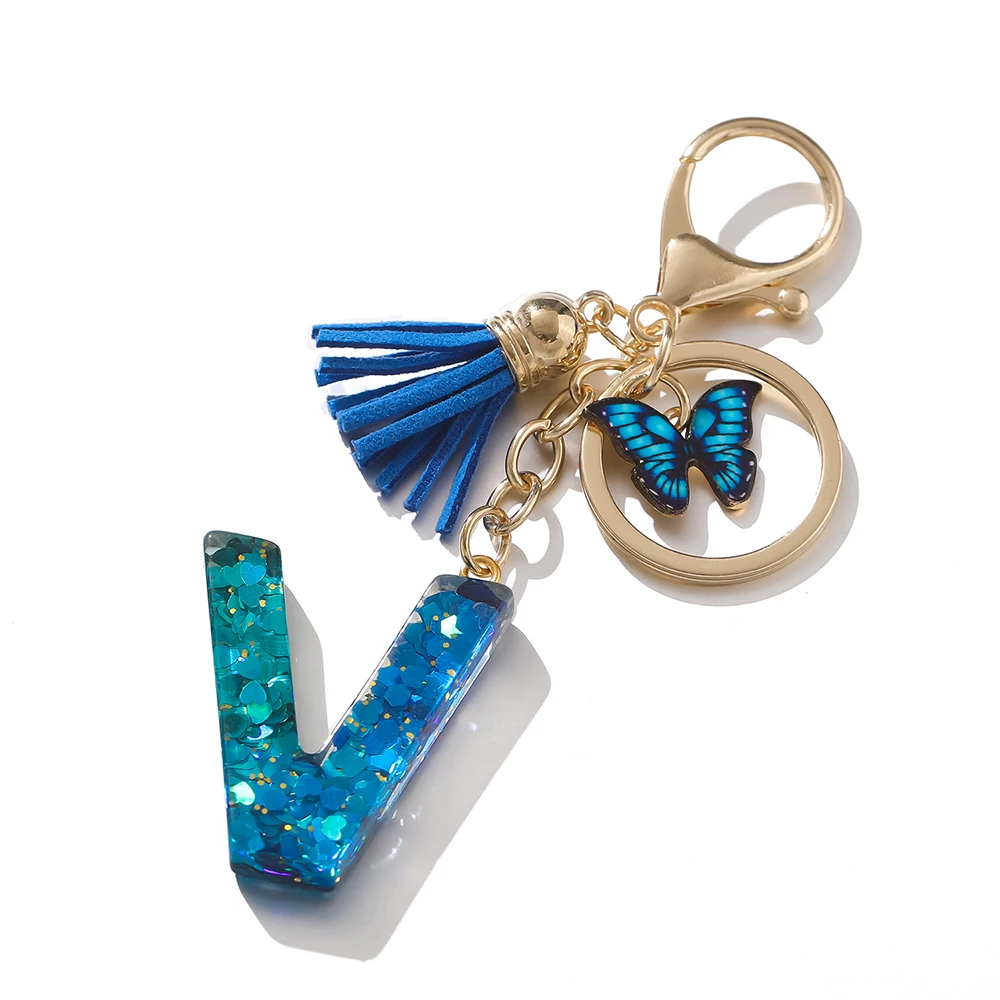 1 قطعة سبائك الأبجدية المفاتيح الأولية الملكي الأزرق فراشة وشرابة رسالة المفاتيح لحقيبة الظهر سحر الإكسسوارات حلقة رئيسية النتائج