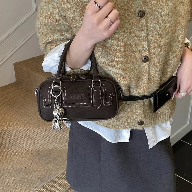 

Модная сумка-боулинг 2026 в корейском стиле люкс: вместительная, нишевый дизайн, для ношения на плече и через плечо