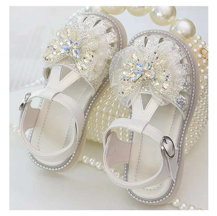 

Girls princess sandals 2026 new summer girls soft sole children butterfly bag head crystal sandals kids shoes girls sandals