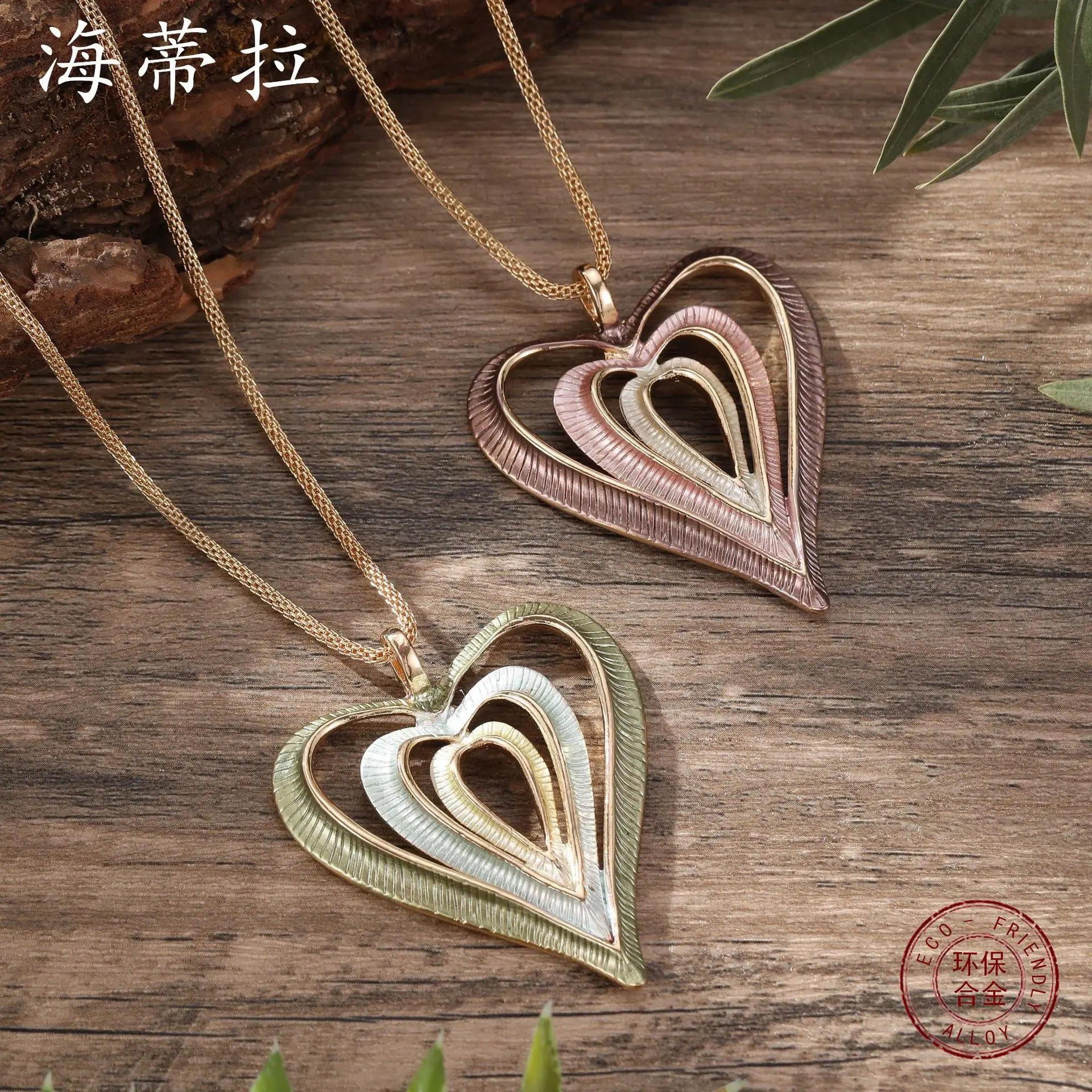 new color painting oil hollow love pendant, personalized and creative heart-shaped women's high-end induction gold