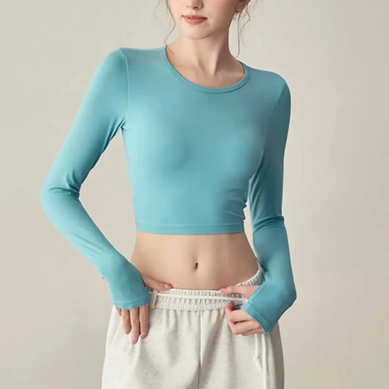 Women's long sleeved yoga suit sports top, high-end tight fitting hollow back fixed chest cushion