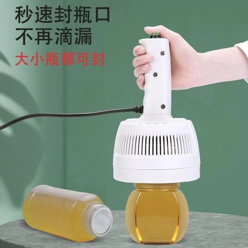 

Integrated handheld electromagnetic induction sealing machine with large diameter and small household honey plastic bottles